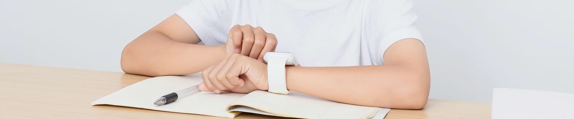 Smart wearable device user checking digital watch